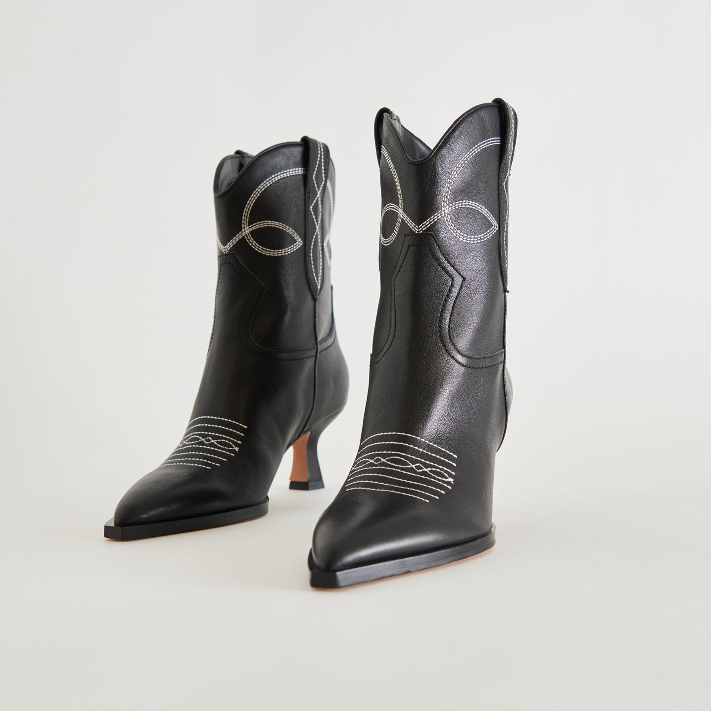 ANGEL BOOTIES BLACK WHITE LEATHER - Dolce Vita