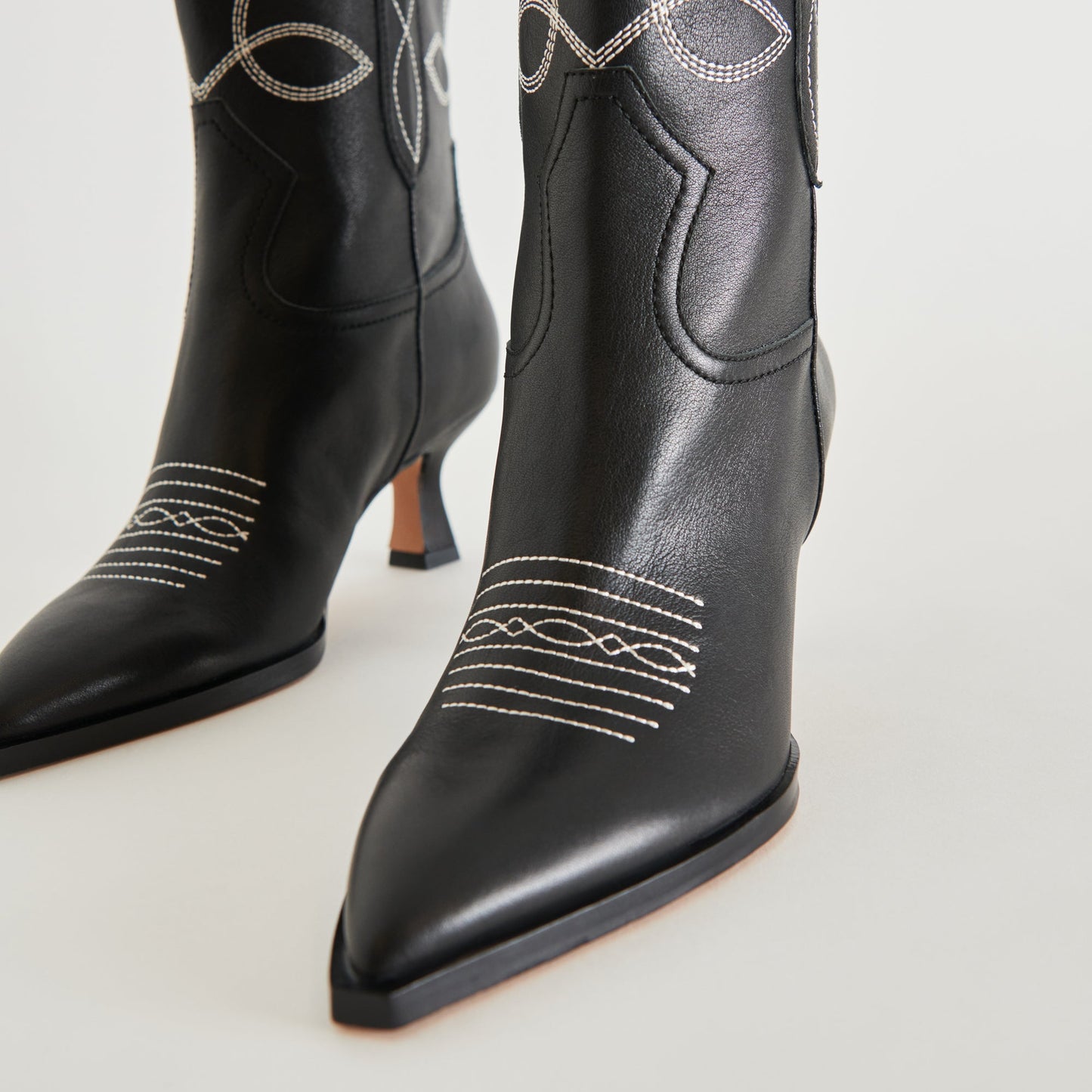 ANGEL BOOTIES BLACK WHITE LEATHER - Dolce Vita