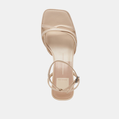 MANJI HEELS BONE PATENT LEATHER - Dolce Vita