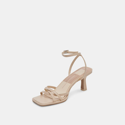 MANJI HEELS BONE PATENT LEATHER - Dolce Vita