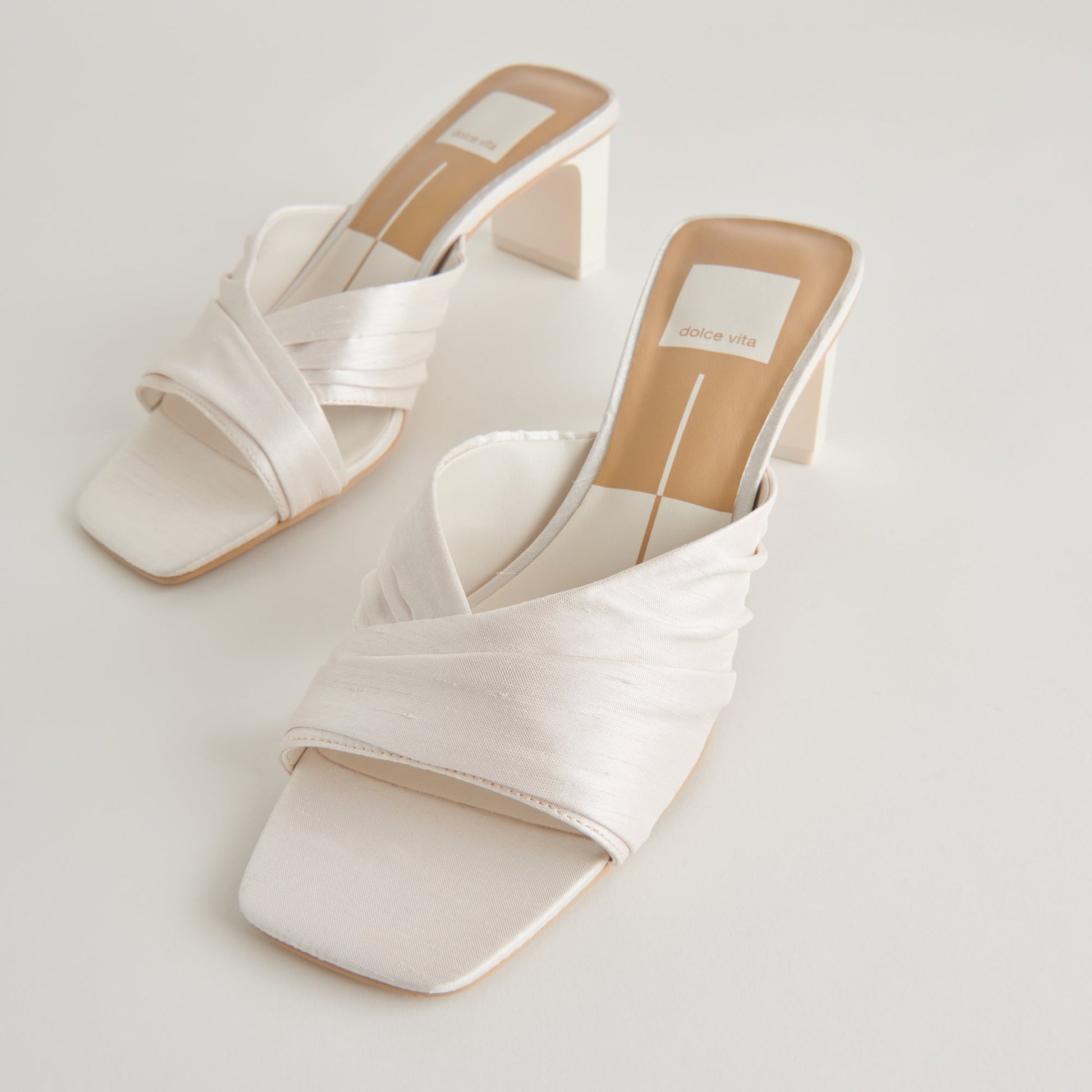 CARLAN HEELS OFF WHITE SILK - Dolce Vita