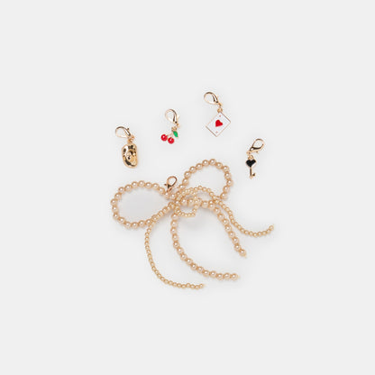 GOLD BOW CHARM PACKAGE ASSORTED - Dolce Vita